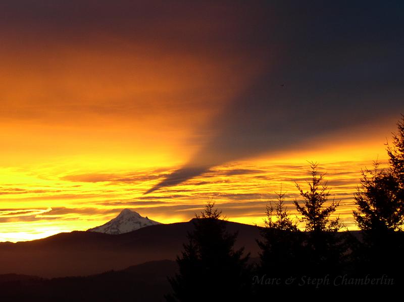 1-05 sunrise.jpg - Shadow of Mt Hood on the sky. (Picture taken by Tim Kredlo)